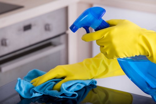 Upholstery cleaning equipment used on a fabric sofa in West London